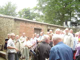 Group photo outside mill